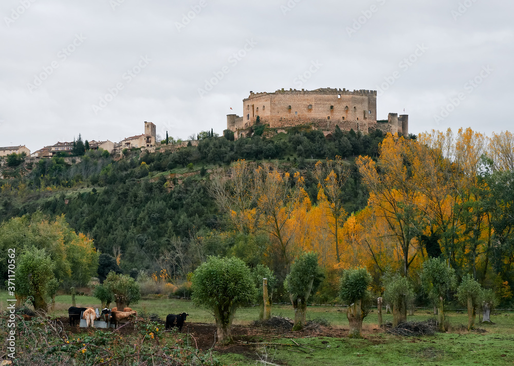 old medieval castle of Pedraza in Segovia, Spain. bucolic Landscape and Dramatic sky with storm clouds at sunset old medieval castle of Pedraza in Segovia, Spain. bucolic Landscape and Dramatic sky with storm clouds at sunset