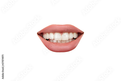 Smiling. Close up view of female mouth wearing nude lipstick over white studio background. Copyspace for insert your ad. Emotions  expression  beauty  fashion  style concept. Cut-out for pattern.