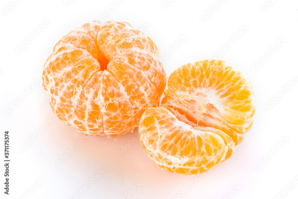Close-up peeled oranges isolated on a white background Close-up peeled oranges isolated on a white background
