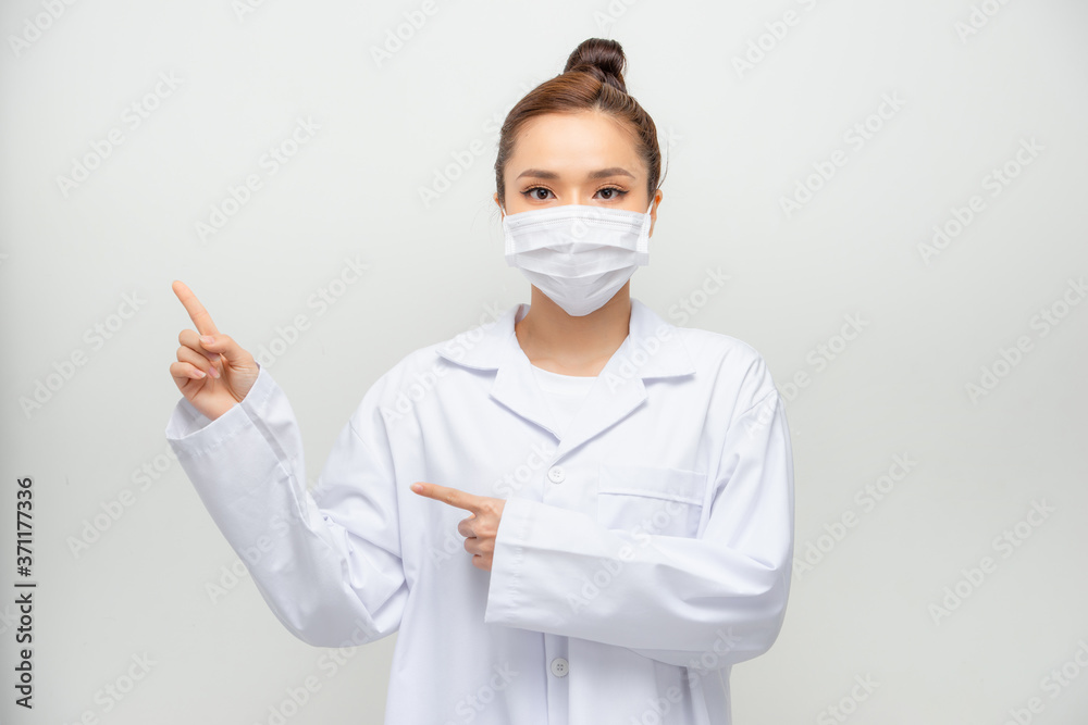 Portrait of an attractive young female doctor in white coat Portrait of an attractive young female doctor in white coat