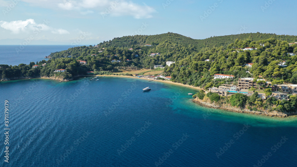 Aerial drone photo of famous seaside area and bay of Kanapitsa with many beautiful secluded sandy beaches, Skiathos island, Sporades, Greece