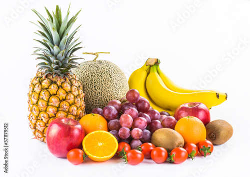 Close-up variety of fresh fruits on the bright table