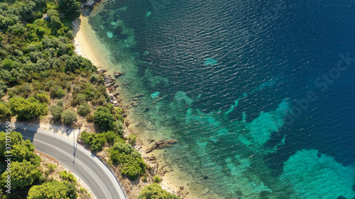 Aerial drone photo of famous seaside area and bay of Kanapitsa with many beautiful secluded sandy beaches, Skiathos island, Sporades, Greece photo