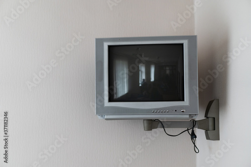 TV with picture tube mounted on the wall
