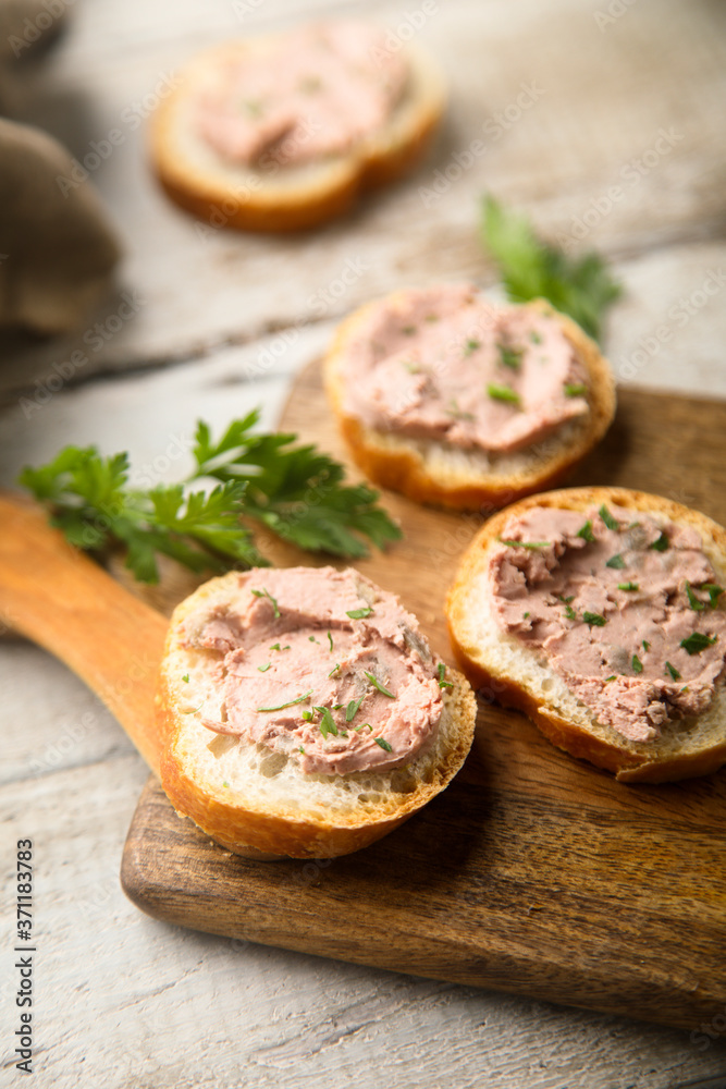 Traditional homemade pate on a white bread Traditional homemade pate on a white bread