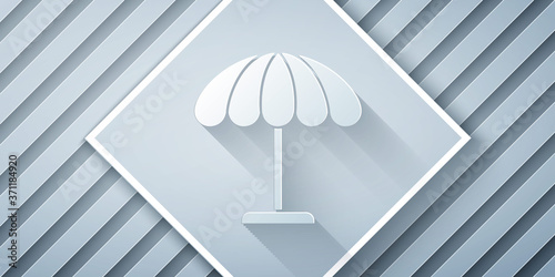 Paper cut Sun protective umbrella for beach icon isolated on grey background. Large parasol for outdoor space. Beach umbrella. Paper art style. Vector Illustration.