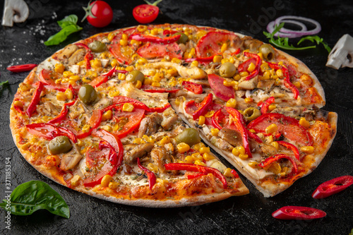 Tasty hot pizza with grilled chicken, corn, olives, tomatoes and cheese . Pizzeria menu. Concept poster for Restaurants