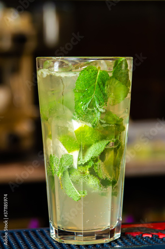 Mojito cocktail on dark background. Close-up, selective focus