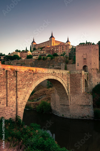 View of Alcantara Bridge and the Alzacar from Toledo  capital of La Mancha  Spain.