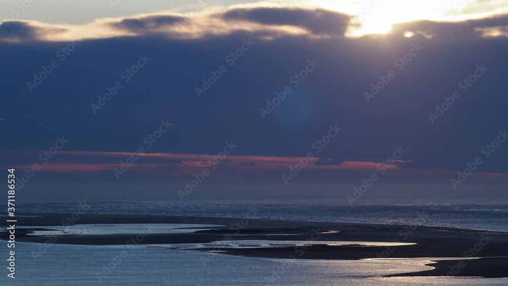 Obraz premium Coucher de soleil sur l'océan atlantique, vu depuis la Dune du Pilat