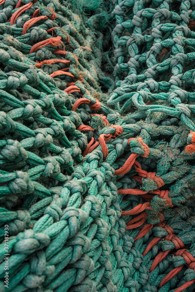 Trawler fishing nets on the dock.