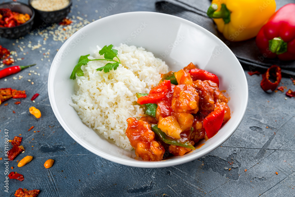 chicken in sweet and sour sauce with rice, chinese cuisine