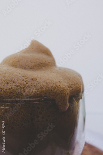 brown foam coffee in white background