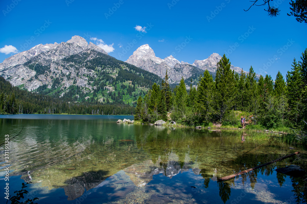 This is a view of Taggart Lake surrounded by the South Teton, Nez Perce, Middle Teton, Grand Teton, Mt. Owen and Teewinot peaks.
Grand Teton National Park is named for Grand Teton. 