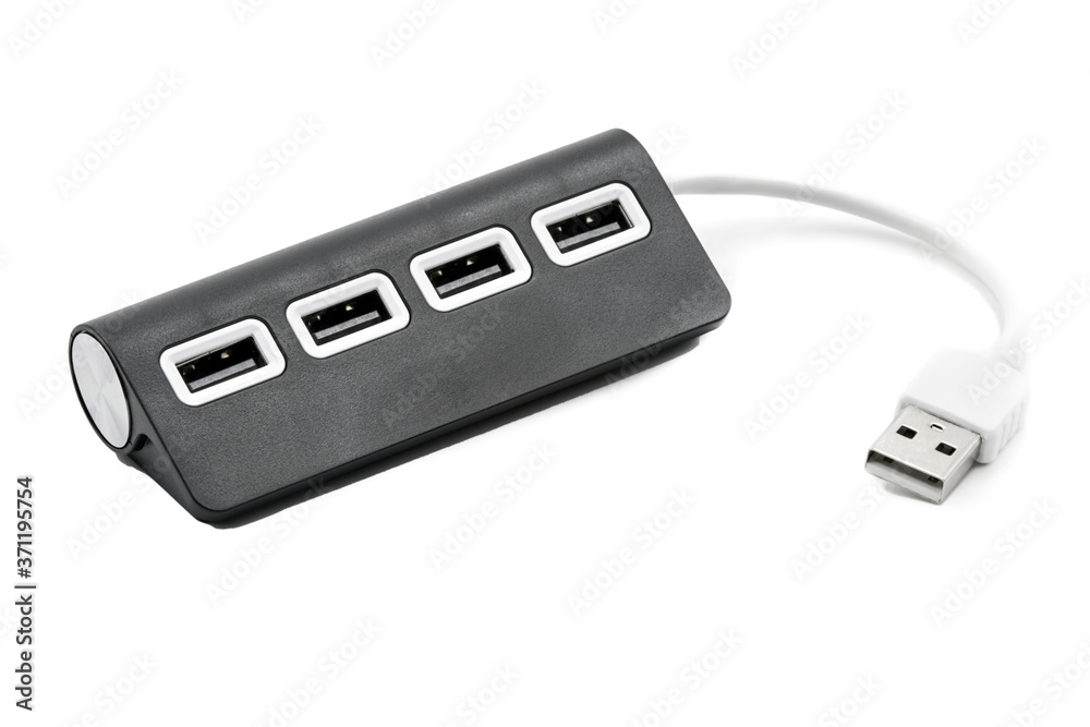 Black portable USB hub for four connections isolated on white background. Bus povered. Black portable USB hub for four connections isolated on white background. Bus povered.