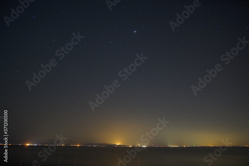 Starry sky on the lake in Japan