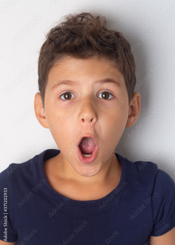 portrait of a surprised boy close up. portrait of a surprised boy close up.