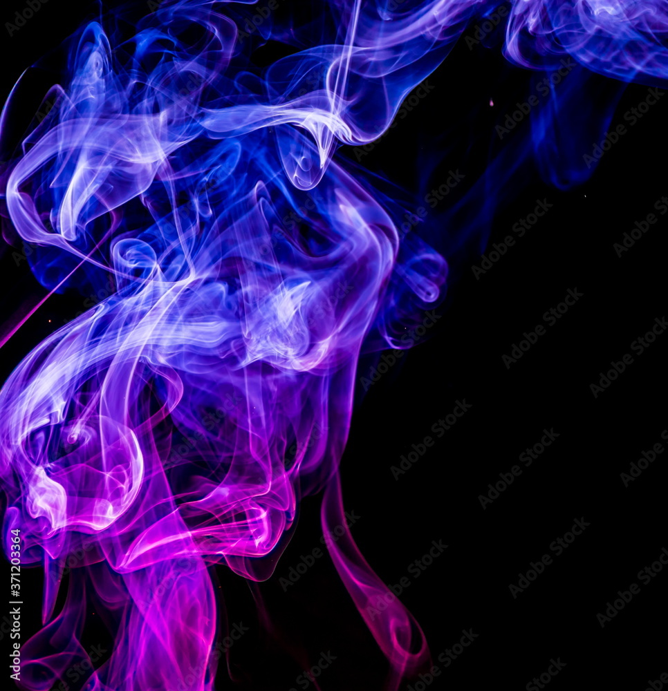 Colored smoke on black background