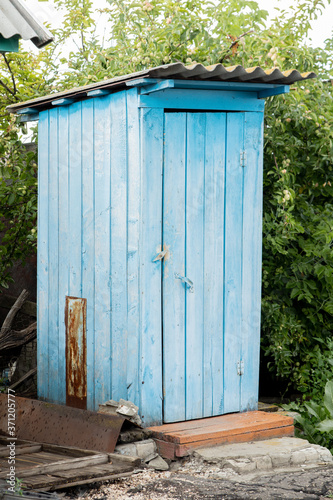 uncomfortable toilet, wooden cabin in the village, no amenities,