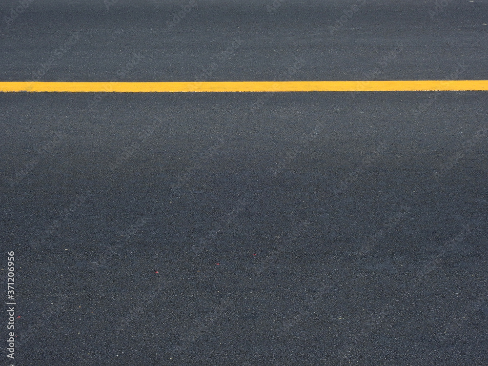 dark asphalt road with yellow line of lane dark asphalt road with yellow line of lane