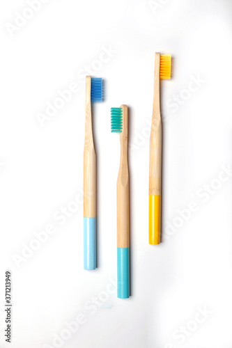 bright toothbrushes on a white background