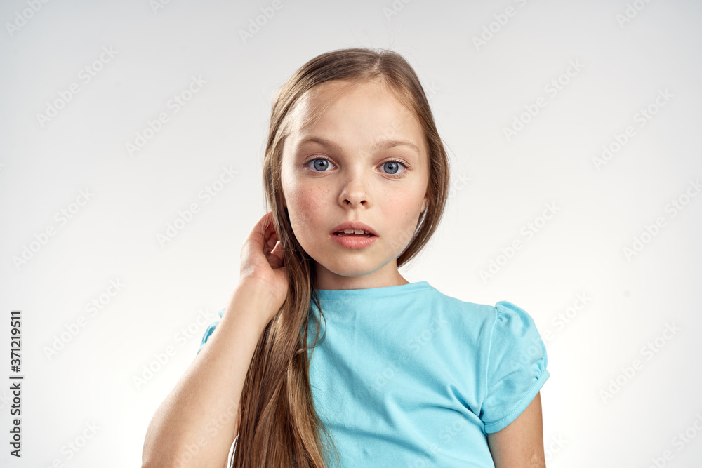cute girl blue dresses cropped view light background emotions childhood fun cute girl blue dresses cropped view light background emotions childhood fun