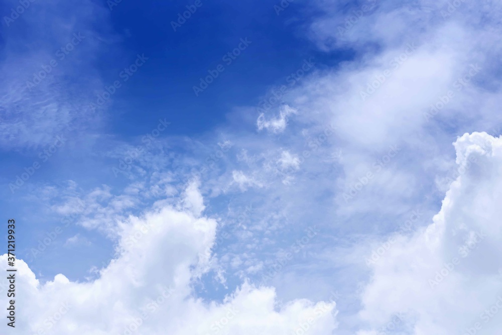 The sky is blue with beautiful clouds.