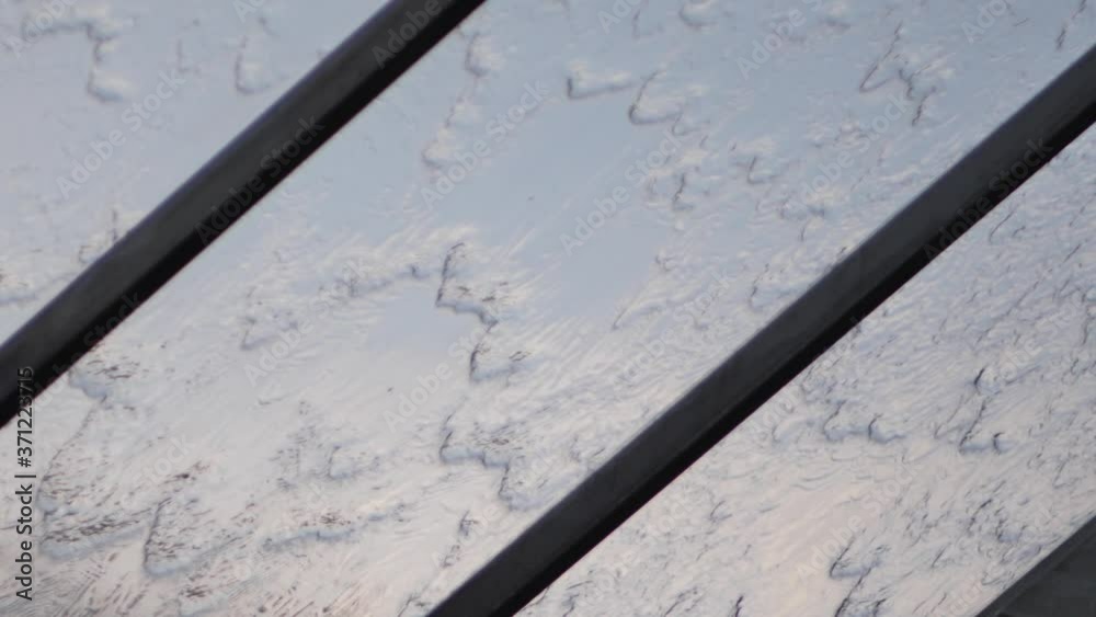 It is raining on the glass roof It is raining on the glass roof