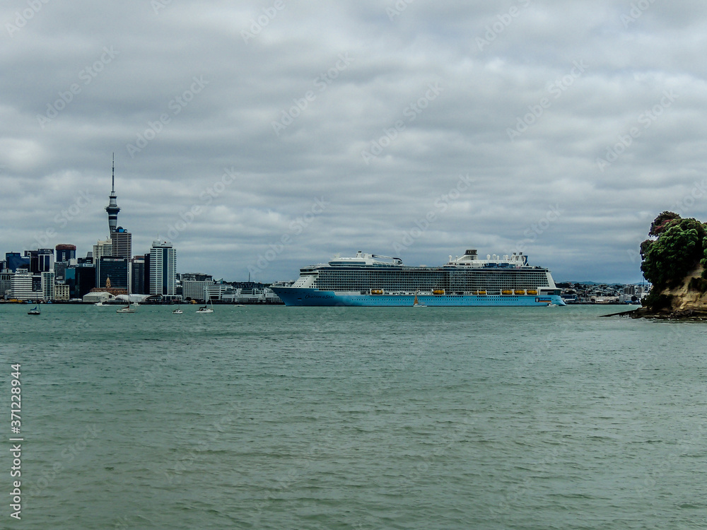 Cruise ships enter and dock in the Auckland Harbour, Auckland, New Zealand