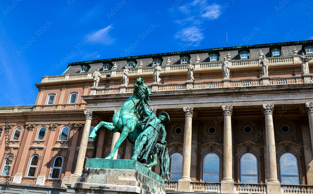 The sculpture of the Horseherd taming horse Front of Royal Palace at Budapest. Hungary