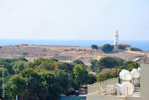 View of ancient Odeon theater and Pafos Lighthouse with Mediterranean Sea on the back in Paphos, Cyprus