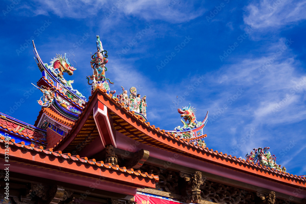 Ornate decoration detail on the rooftop of the temple in Taiwan.
