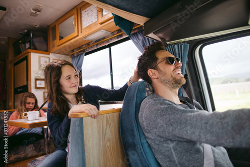 Man driving motorhome on vacation. photo