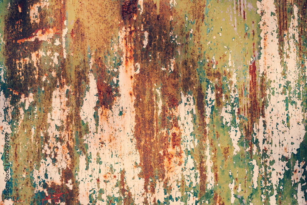 Creative bright metallic background. Flat background texture of dirty rusty metal. Bright rusty spots as the main background for a vintage scratched design