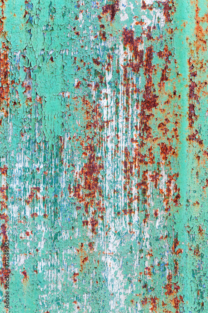 Creative bright metallic background. Flat background texture of dirty rusty metal. Bright rusty spots as the main background for a vintage scratched design