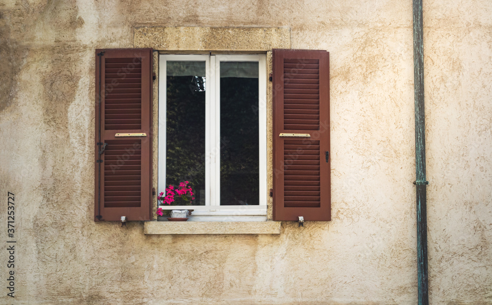 Fototapeta premium Venetian architecture. Buildings in daylight, windows, beautiful old places.