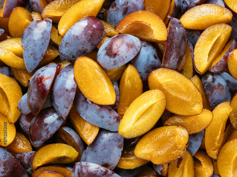 Quartered fresh plums Quartered fresh plums