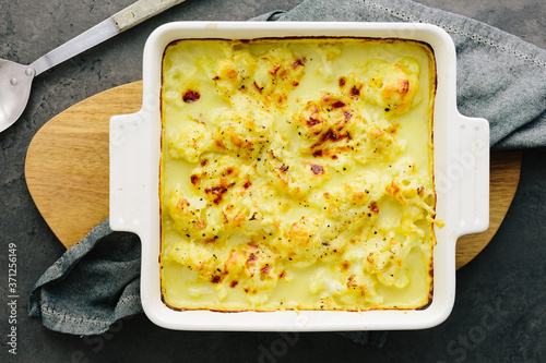 Cauliflower Cheese in ovenware dish photo