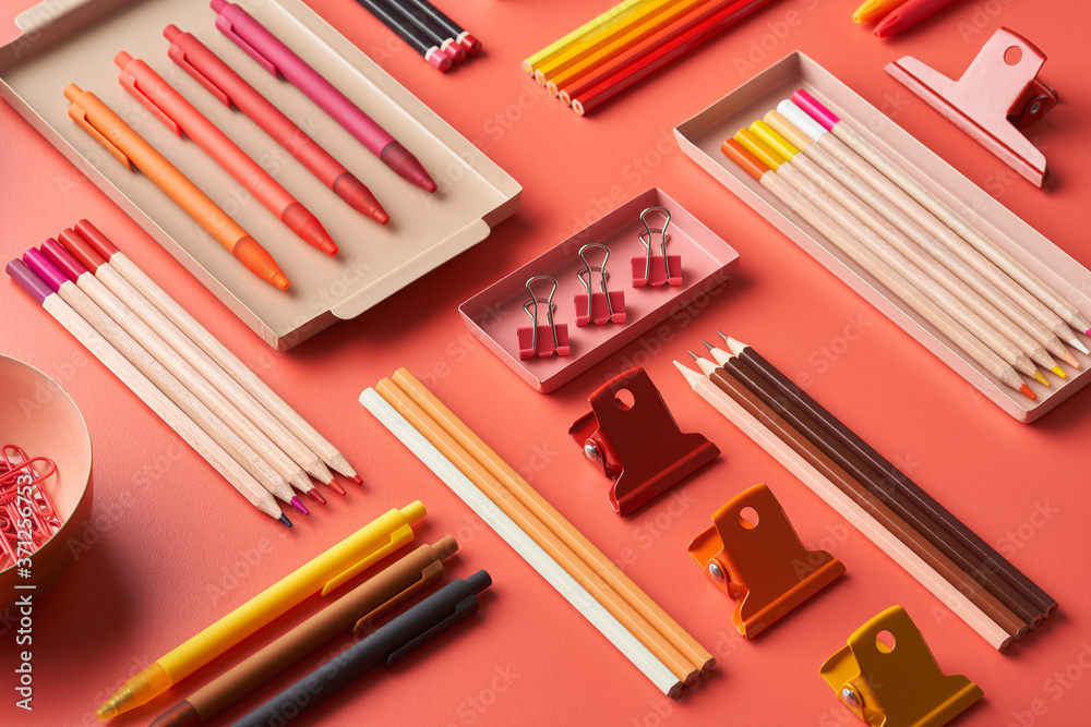 Multicolored stationery arranged on table Multicolored stationery arranged on table