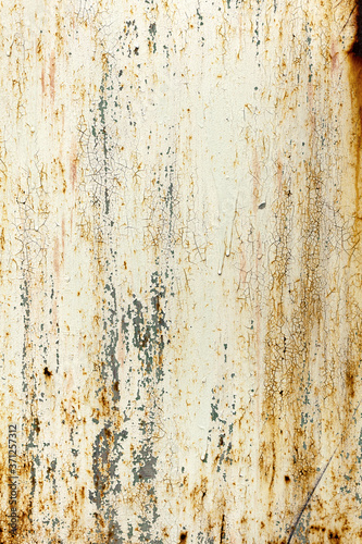 Creative bright metallic background. Flat background texture of dirty rusty metal. Bright rusty spots as the main background for a vintage scratched design © Elena