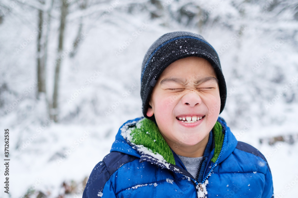 Portrait of Silly Asian Kid During Winter Portrait of Silly Asian Kid During Winter