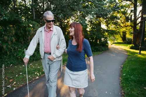 Senior man and middle age woman enjoying spending time together