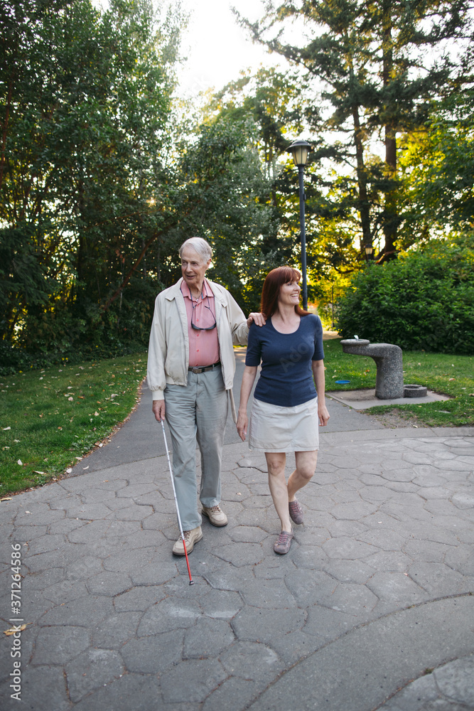 Senior man and middle age woman enjoying spending time together Senior man and middle age woman enjoying spending time together
