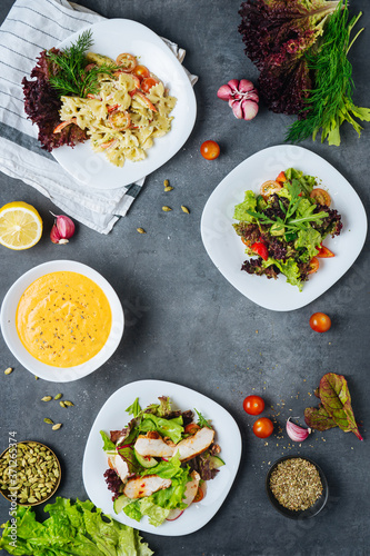 Various delectable salads with herbs and sauce