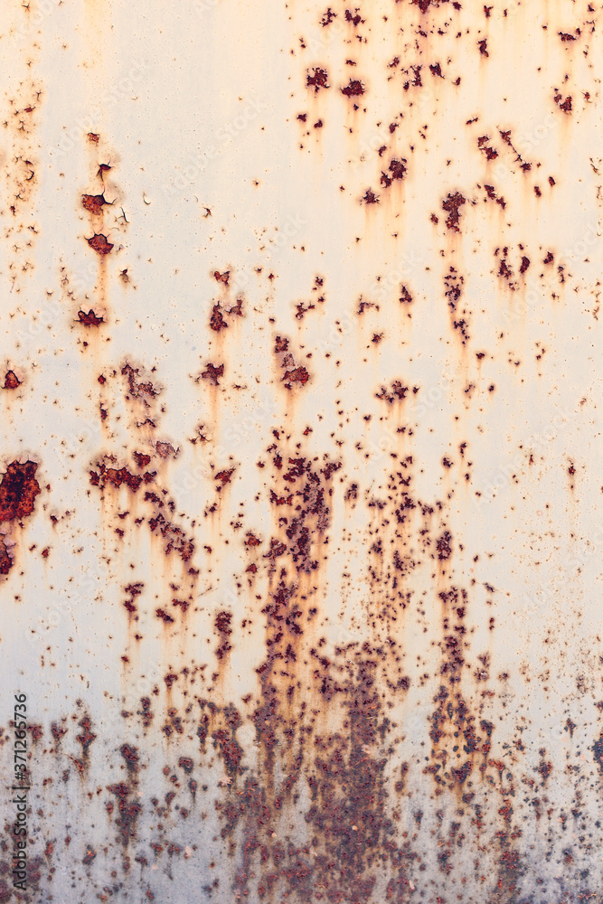 Creative bright metallic background. Flat background texture of dirty rusty metal. Bright rusty spots as the main background for a vintage scratched design Creative bright metallic background. Flat background texture of dirty rusty metal. Bright rusty spots as the main background for a vintage scratched design