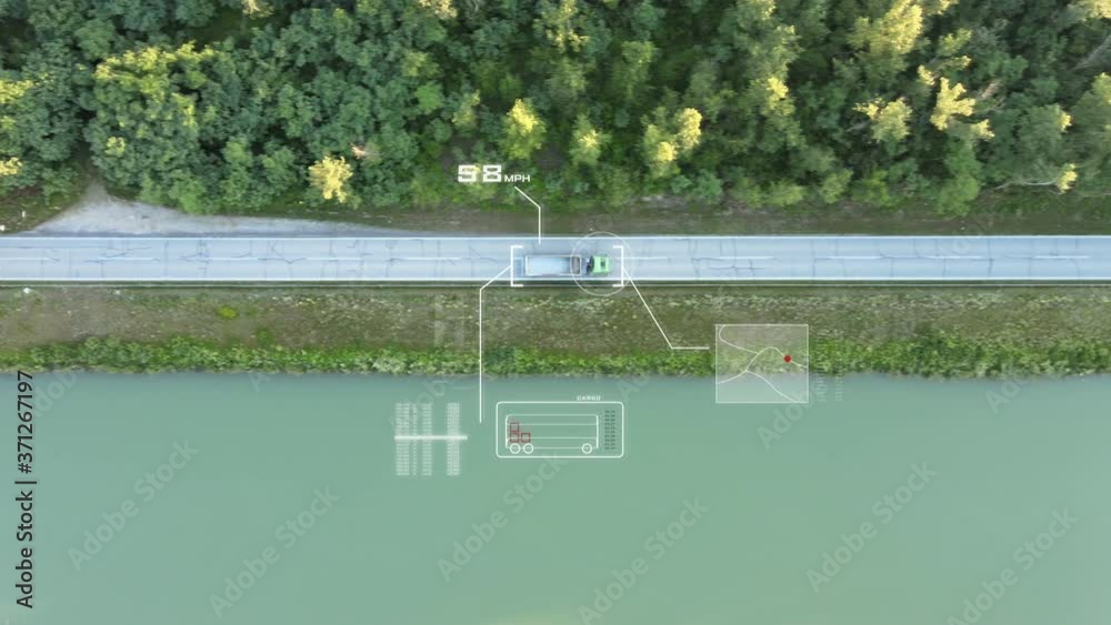 Aerial footage of a new hi tech futuristic way of control the speed of the truck and reveal detail about the truck. Artificial Intelligence Scans data with surveillance purpose