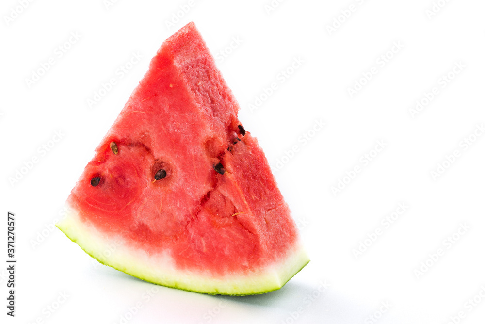 Slice of watermelon isolated on bright background Slice of watermelon isolated on bright background