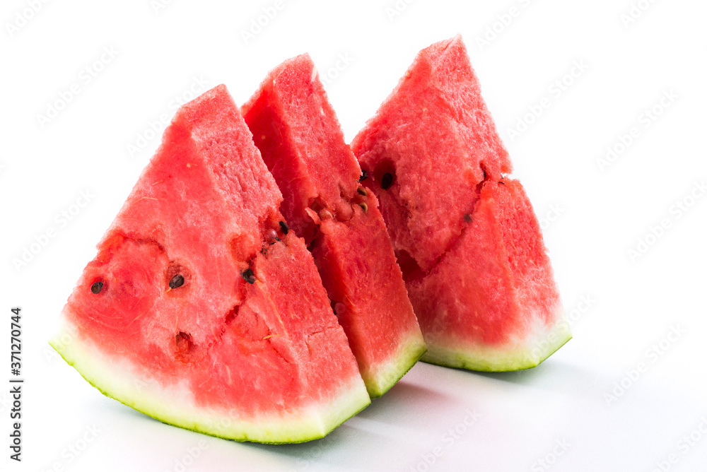 Slice of watermelon isolated on bright background Slice of watermelon isolated on bright background