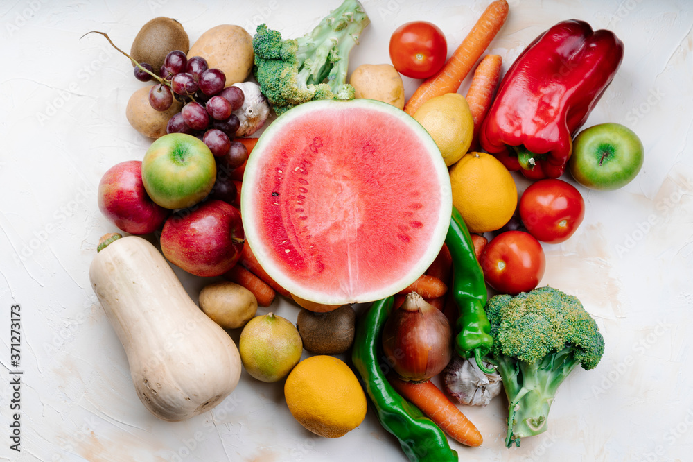 set of fruits with watermelon in the center
