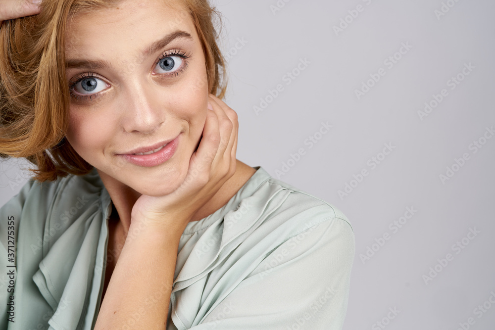 portrait of a woman in a shirt beautiful eyes close-up portrait of a woman in a shirt beautiful eyes close-up